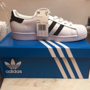 NIB Adidas Superstar size 5.5 men’s shoe.